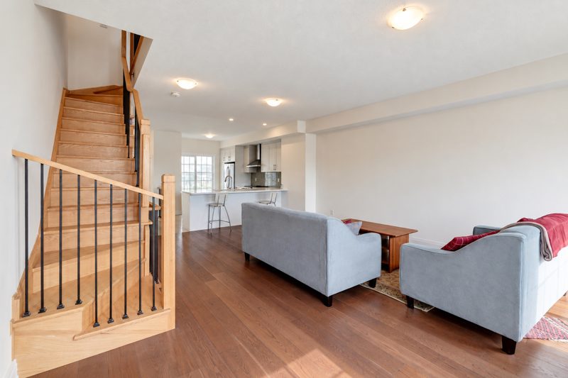 40 Clippers Crescent, Stouffville: living room and stairs