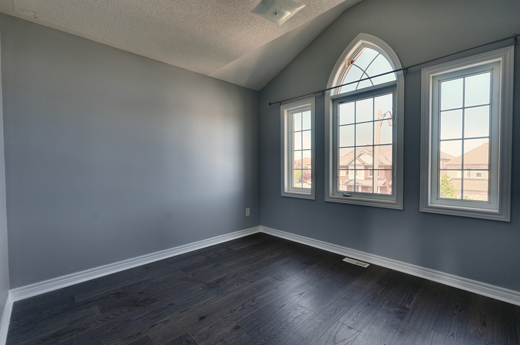 Bedroom with arched window